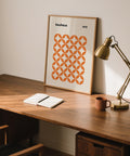 Bauhaus-inspired orange minimalist print with sharp circle grid layout.
