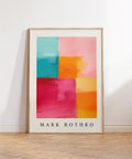 Colourful abstract wall art with pink, orange, yellow, and teal colour blocks.