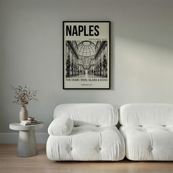 Black and white travel wall art of a covered arcade with storefront openings and distant archway