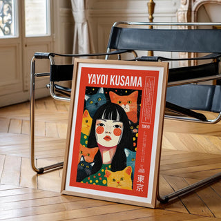 Bold and graphic quirky wall art featuring cats and a serious-faced girl.