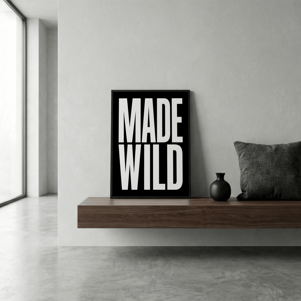 Bold black MADE over WILD vertical typography poster