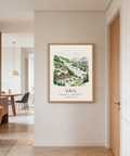 Illustrated mountain village poster with chalets, pond, and evergreen trees