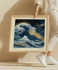 Abstract ocean wave wall art with gold accents.