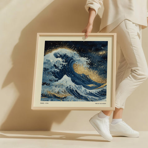 Abstract ocean wave wall art with gold accents.