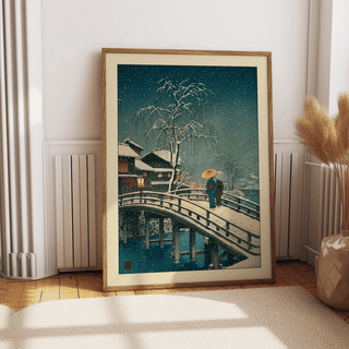 Living room mockup showing curved bridge scene in winter tones on wall