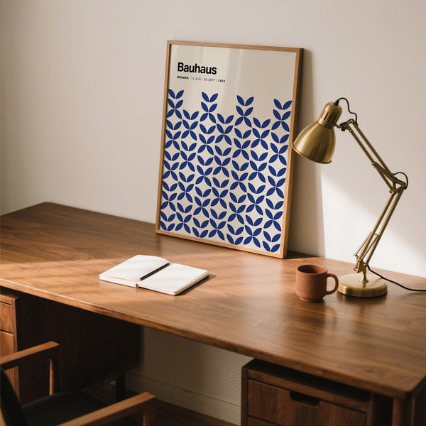 Modern simple wall art featuring abstract floral shapes in deep blue.