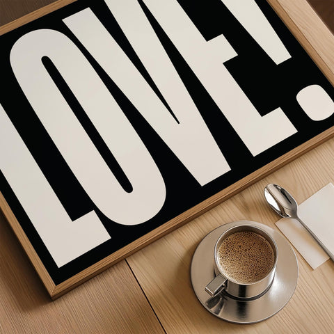 Contemporary LOVE wall art in monochrome for entryway styling.