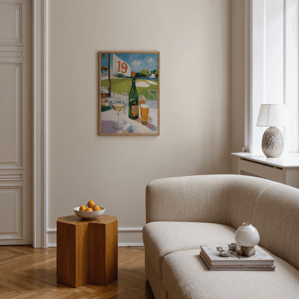 Clubhouse table poster showing green bottle, beer glass, and golf ball with fairway and sand bunker behind