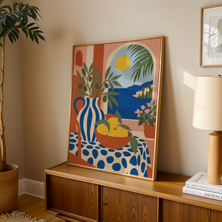 Italian coast print with a table of lemons leaning on a wooden sideboard in a warm living room