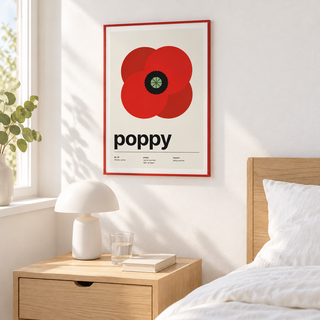 Red poppy print above a bedside table in a calm bedroom