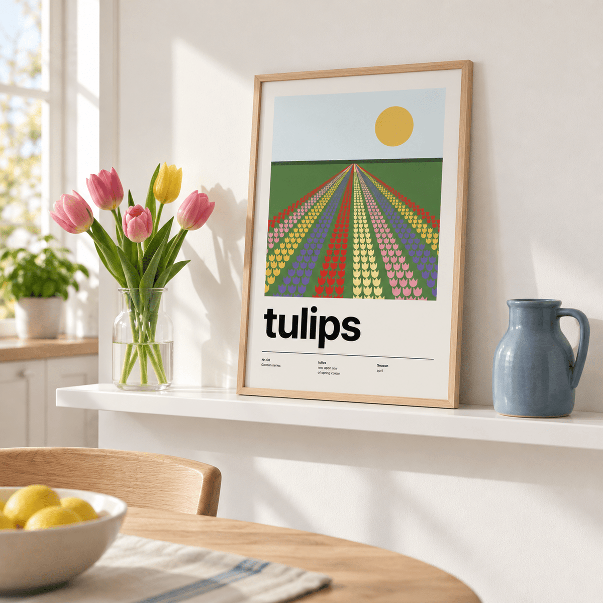 Tulip field print leaning on a picture ledge with books
