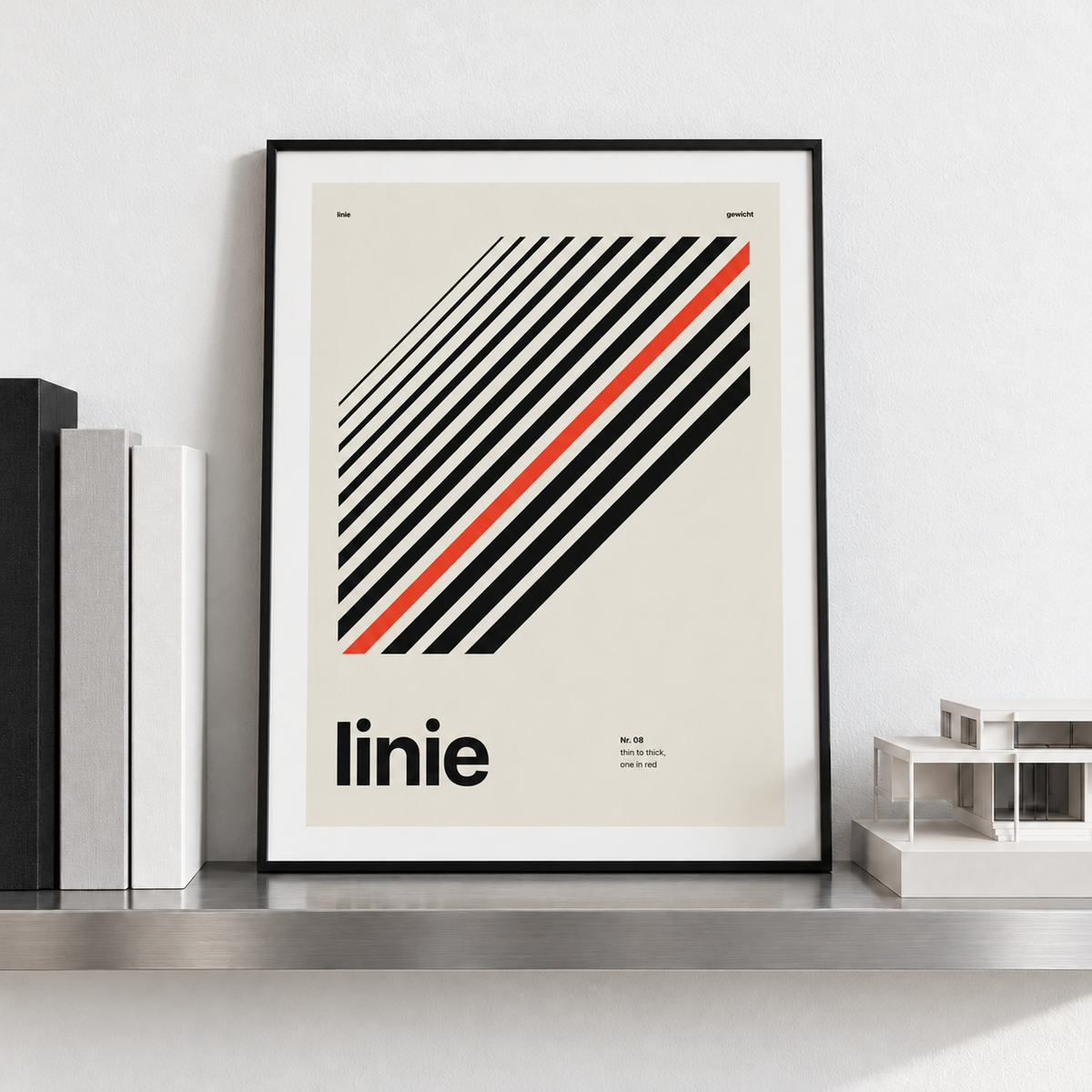 Diagonal black lines print leaning on a picture ledge