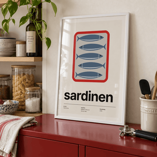 Open tin of sardines print in a pantry cabinet against a red wall