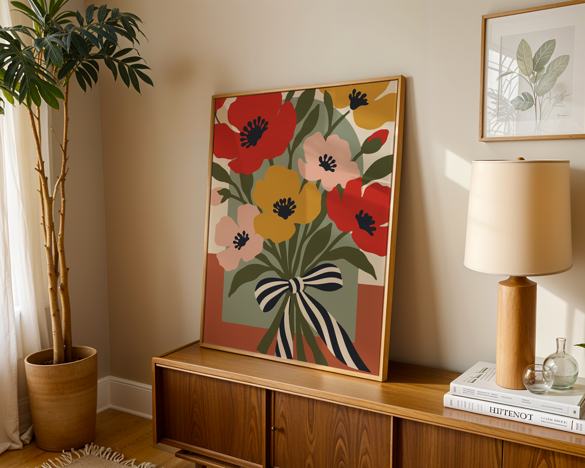 Flower bouquet print of poppies leaning on a wooden sideboard in a warm living room