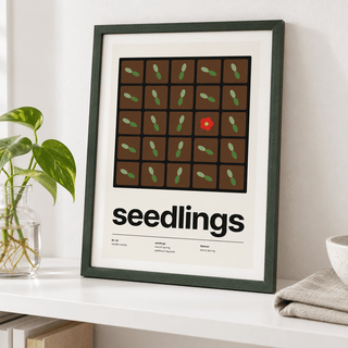 Seed tray gardening print leaning on a shelf beside potted plants