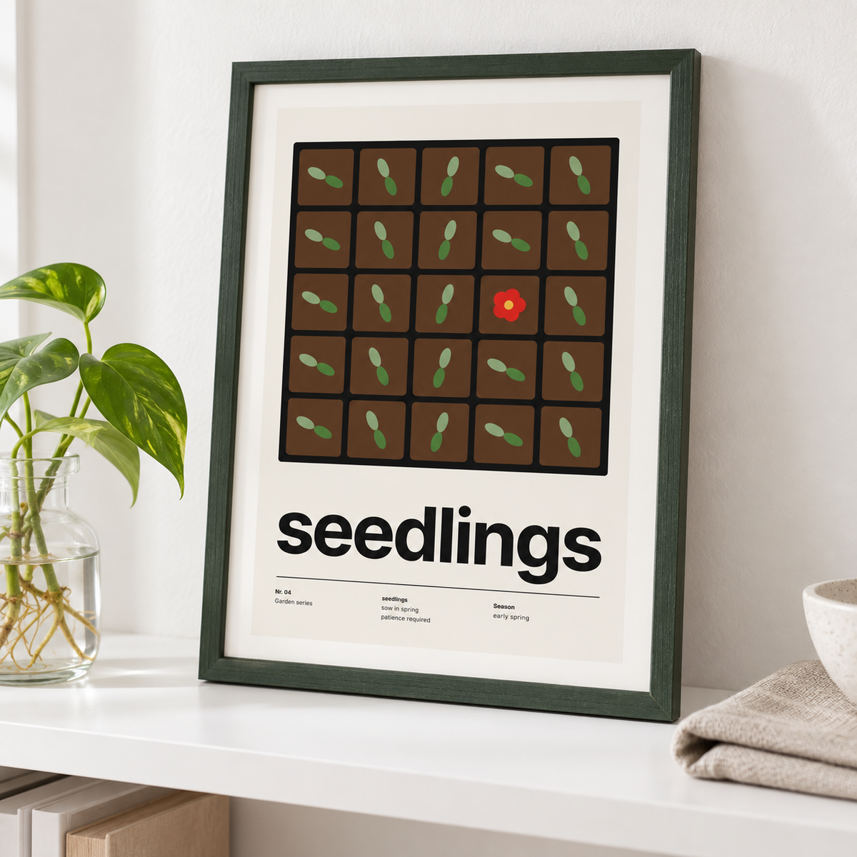 Seed tray gardening print leaning on a shelf beside potted plants