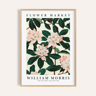 Magnolia wall art close-up of pink magnolia flowers and dark green leaves in a wooden frame