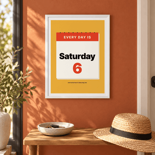 Every day is Saturday print above a console in an entrance hall