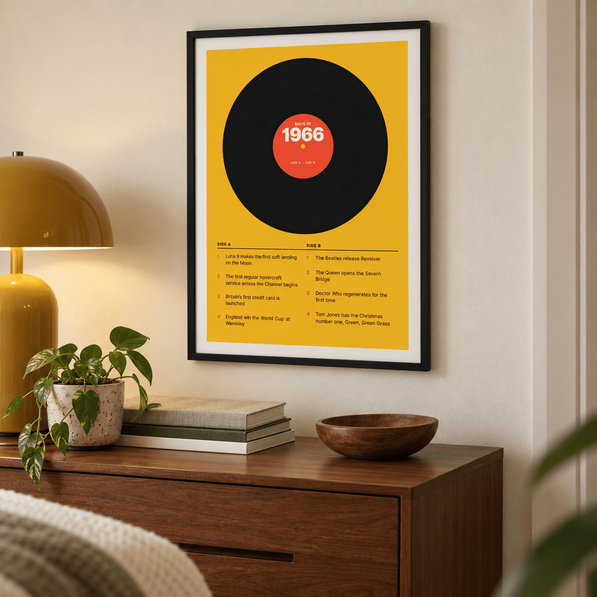 1966 print styled as a vinyl record on mustard above simple furniture at home
