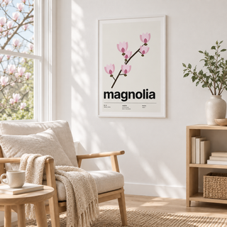 Magnolia flower print above an armchair in a cosy reading corner