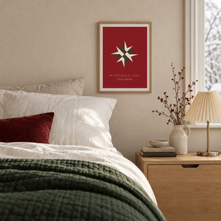 Red paper star Christmas print in a guest bedroom at Christmas