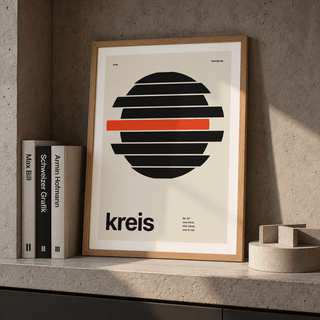 Black circle in horizontal slices print leaning on a picture ledge
