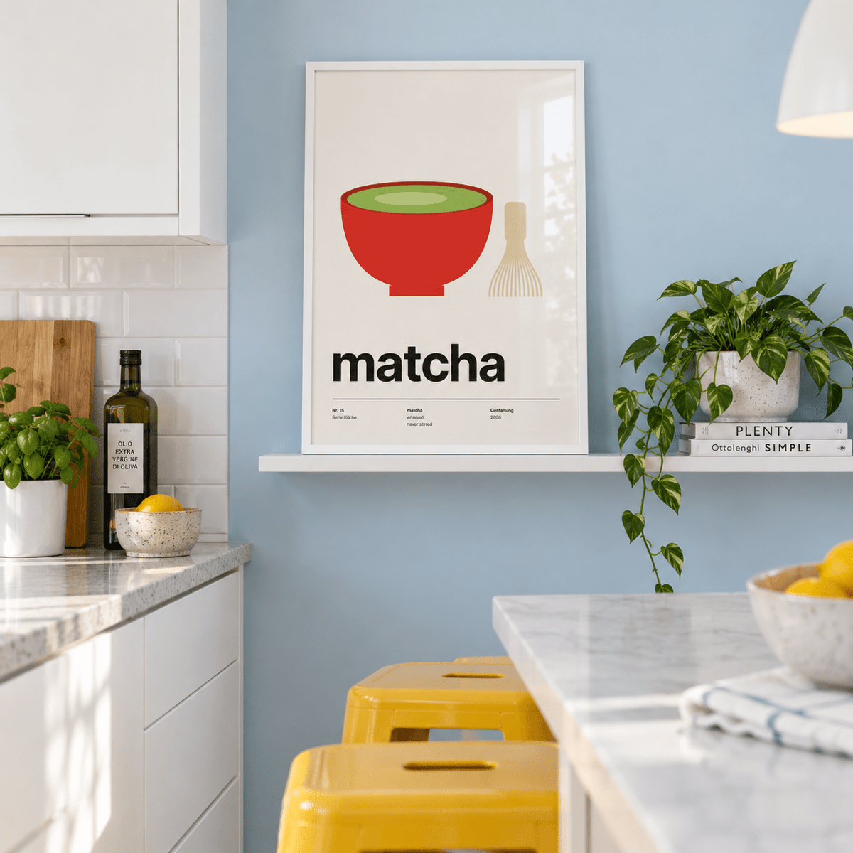 Red bowl of green matcha print on a shelf in a kitchen against a blue wall