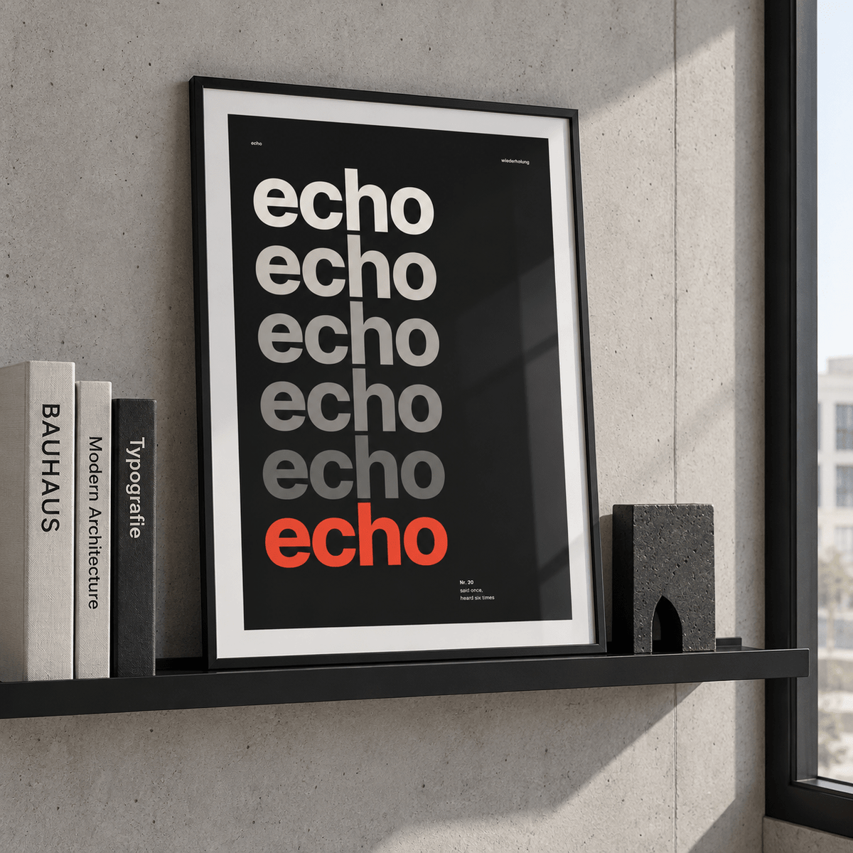 Repeating echo word poster leaning on a picture ledge
