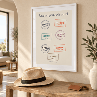Passport stamps retirement print above a console table in a hallway