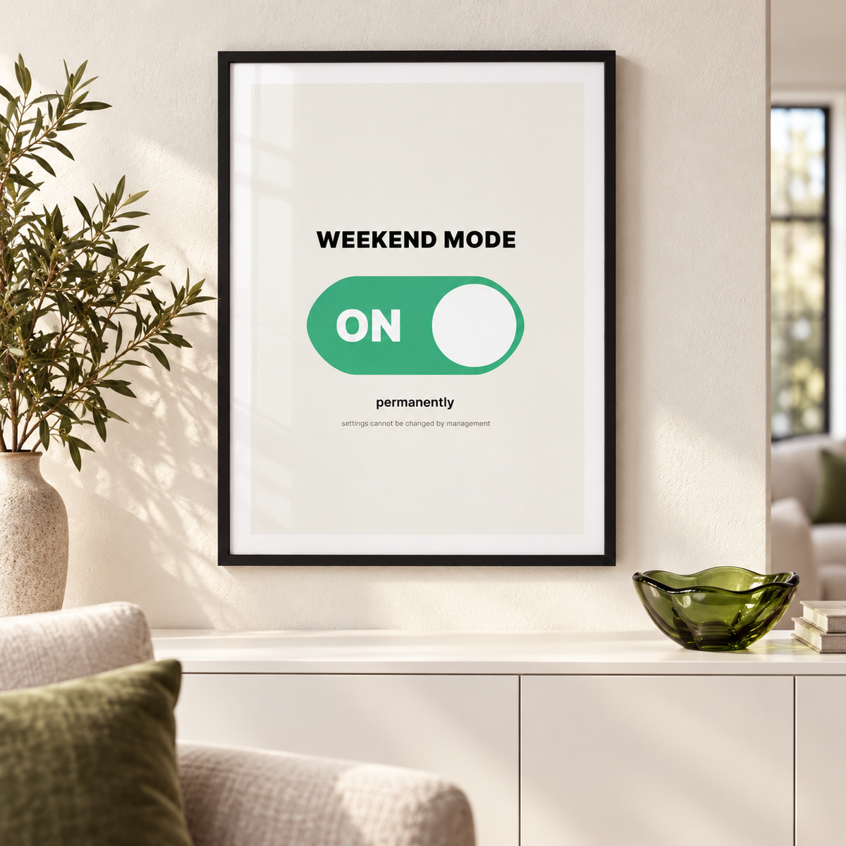 Weekend mode on switch print above a wooden sideboard in a living room
