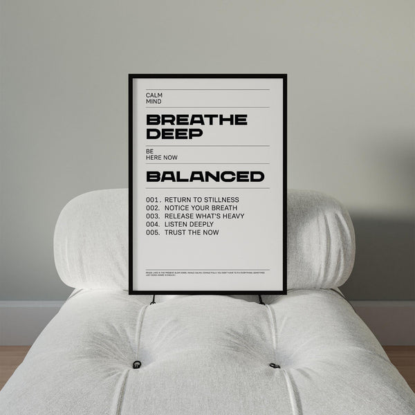 Minimalist wall art featuring “Breathe Deep” and “Balanced” messages.