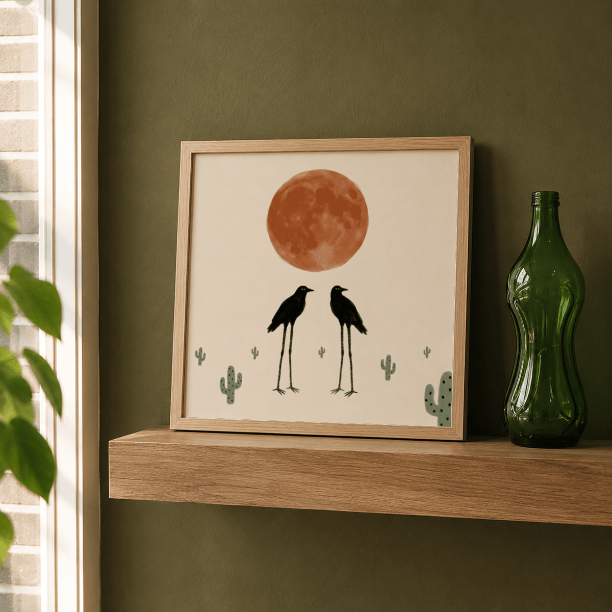 Playful animal illustration of two black birds facing beneath desert moon