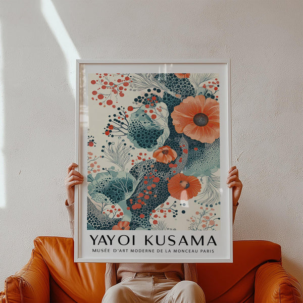 Orange and teal wall art with cream background and bold floral details