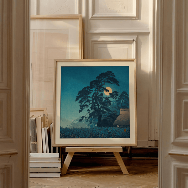 Hasui Kawase moon print art piece showing roofline beneath moon