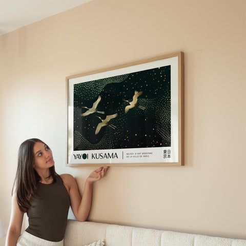 Horizontal wall art for living room featuring graceful flying cranes.