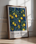 Lemon Wall Art for Kitchen with ripe yellow lemons and blue leaf background.