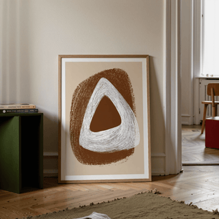 Living room setting featuring a framed Boho Geometric Art Print above a console