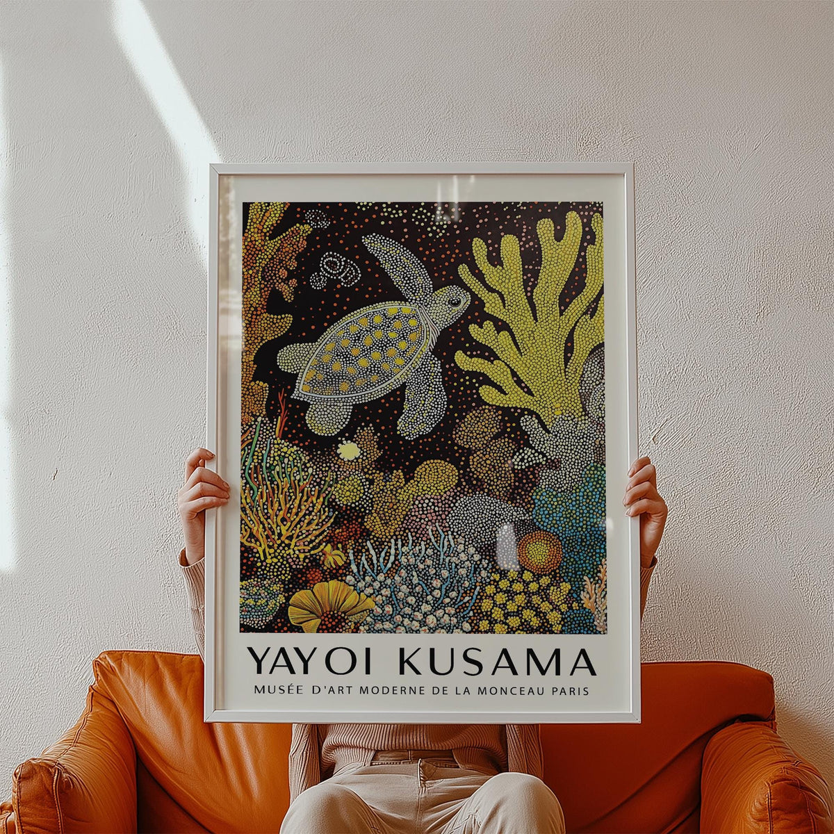Sea turtle wall art swimming through abstract coral in Kusama style.