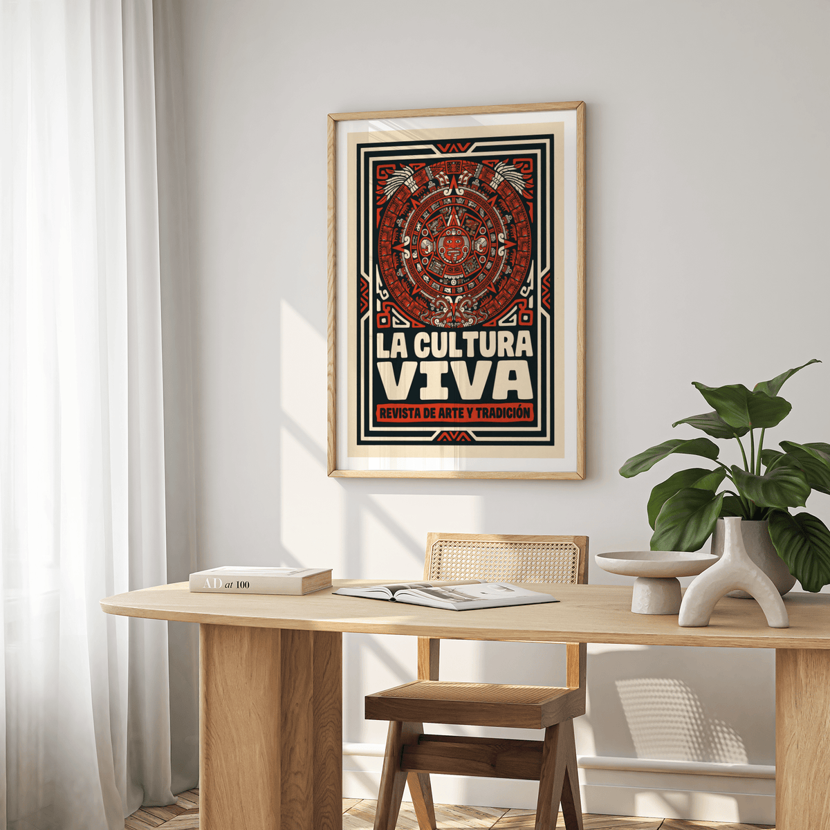 Red and black poster print showing Aztec calendar-inspired design with block lettering