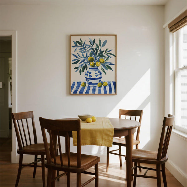 Decorative olive tree wall art with fresh olives in a ceramic container.