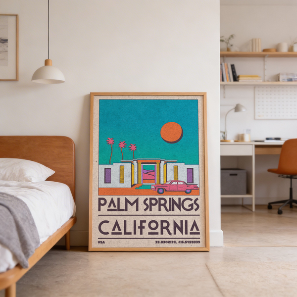 Vintage-style travel wall art print of Palm Springs with car in foreground and strong negative space sky