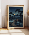 Moonlit Bridge Art Print with glowing lantern reflections in night river