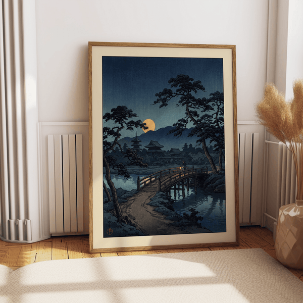 Moonlit Bridge Art Print with glowing lantern reflections in night river