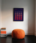 Graphic design poster hanging in a mid-century modern living space.