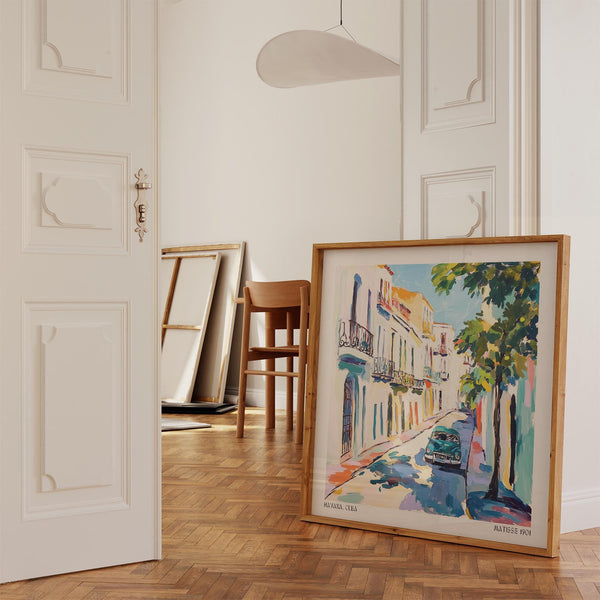 Cuba cityscape with colorful buildings and painterly shadows.