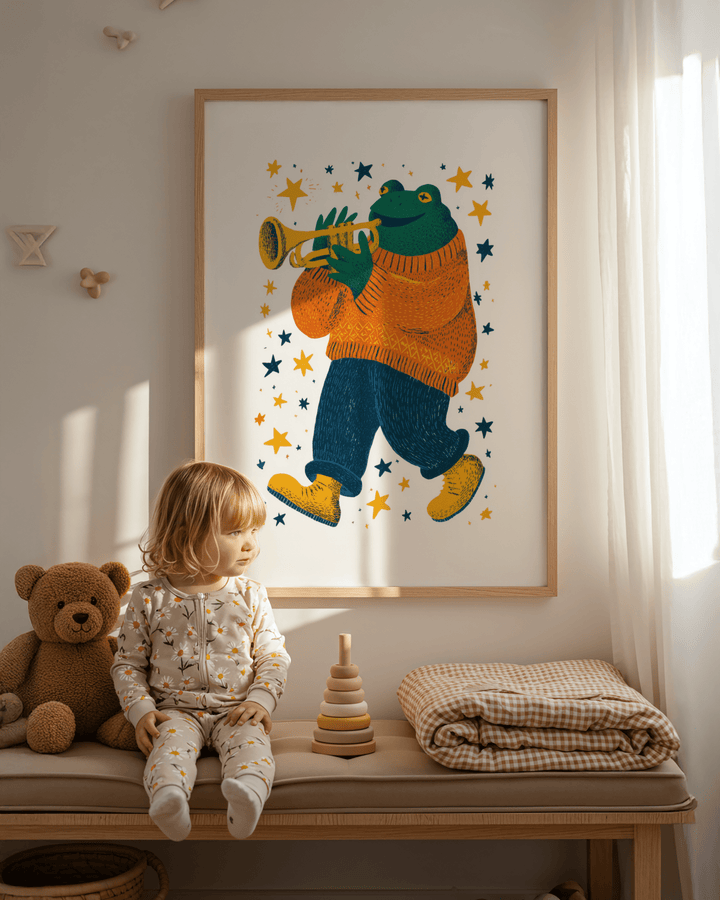 Print of frog playing trumpet art with bright stars in a child’s bedroom with soft sunlight and teddy bear