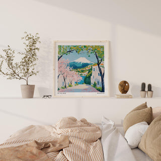 Painterly artwork of Japan’s Mt. Fuji surrounded by fresh greenery.