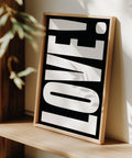 Stylish LOVE print for office or home, featuring bold lettering.