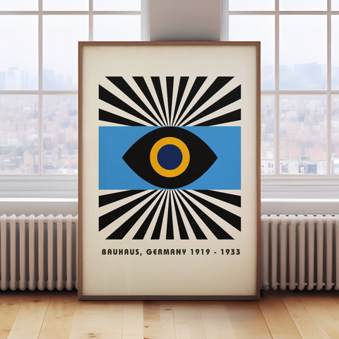 Bold Bauhaus-inspired eye wall art with radiating lines, perfect for mid-century interiors

