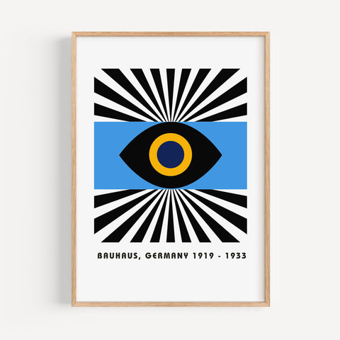 Bold Bauhaus-inspired eye wall art with radiating lines, perfect for mid-century interiors
